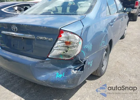 2003 Toyota Camry Le z USA, uszkodzony, nr VIN JTDBE32K130182354